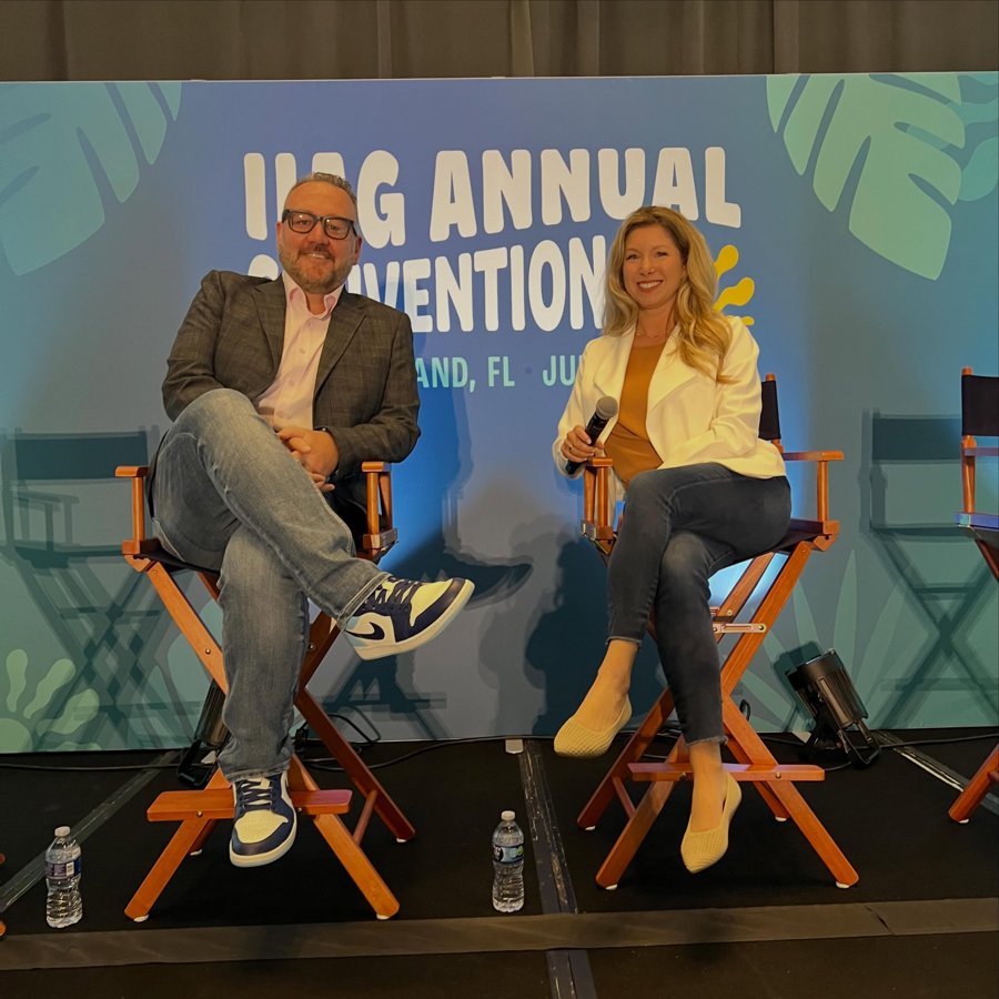 Casey Nelson and Jessica Holder speaking on stage together